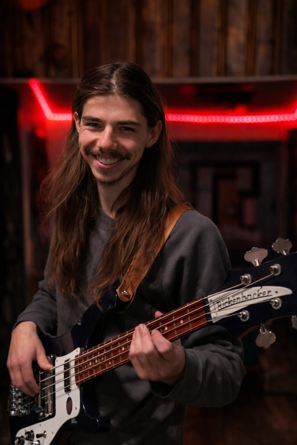 Jack Bartley holding a bass guitar