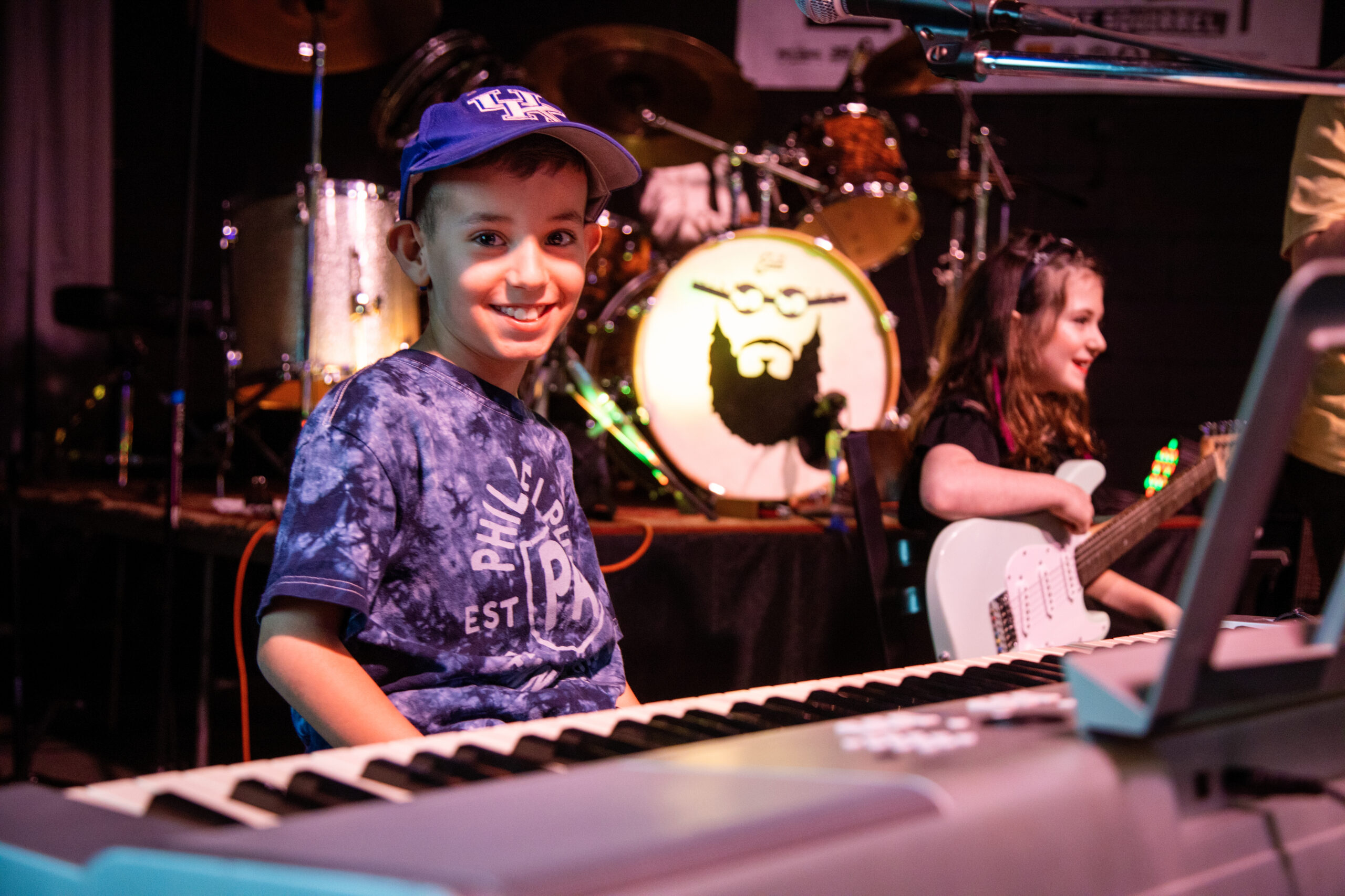 A drummer behind the band